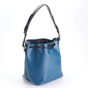 Louis Vuitton authentic petit noe drawstring bag.  Made in France.